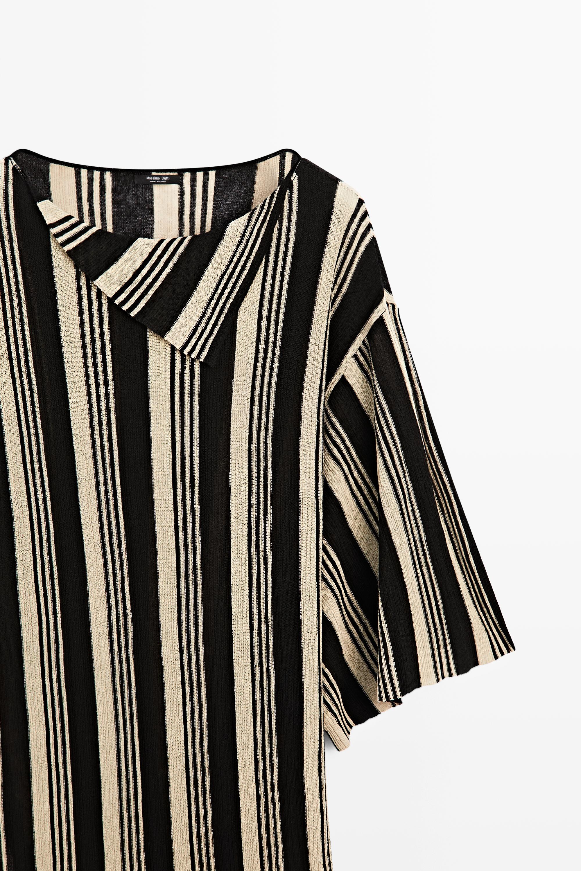 Pull en maille style tunique rayé